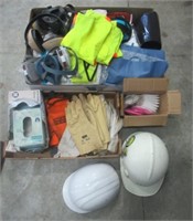 Shelf full that includes hard hats, ear muffs,