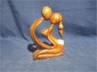 hand carved man and woman