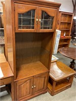 Wood cabinet with adjustable glass shelf