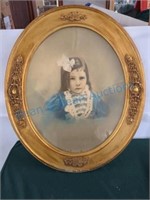 Antique photo in oval frame