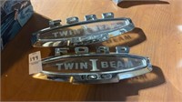 Pair of Ford 100 Twin Beam Emblems One Is Cracked
