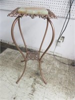 ANTIQUE METAL AND MARBLE TOP CLAW FOOTED PLANT