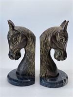 Pair of Vintage Brass Horse Head Bookends on Gray