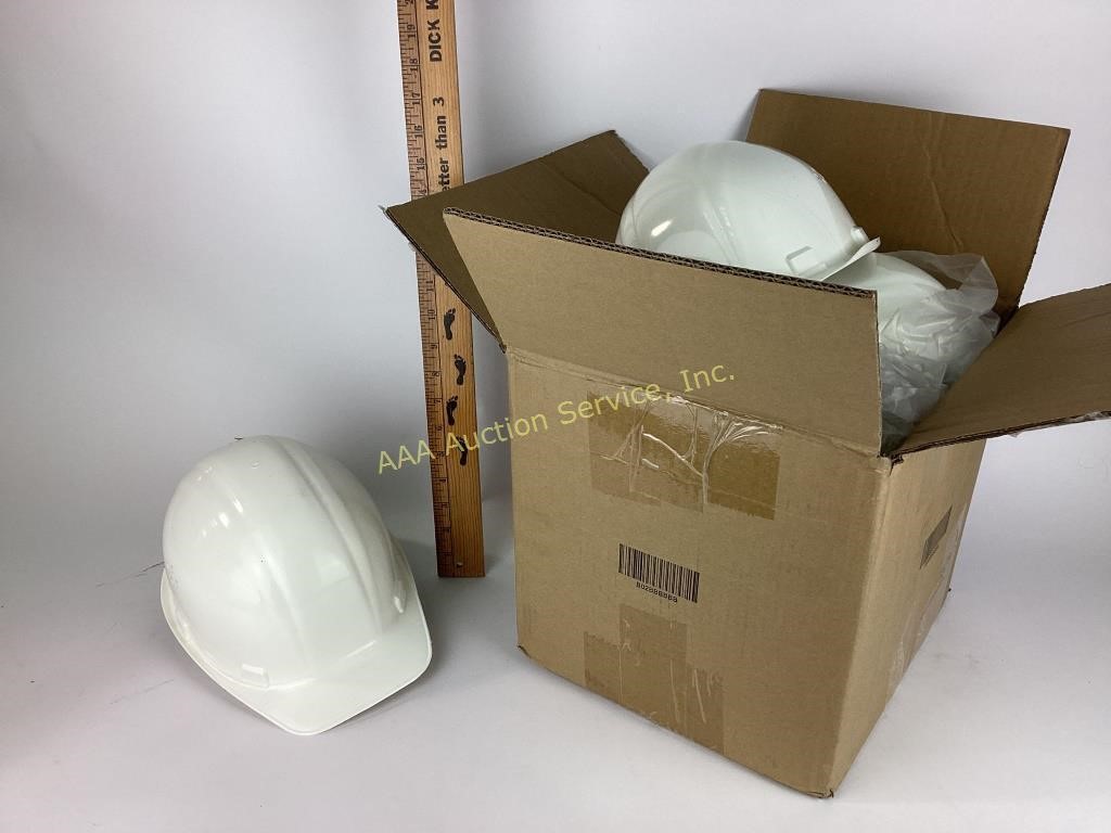 White construction hardhats six new.