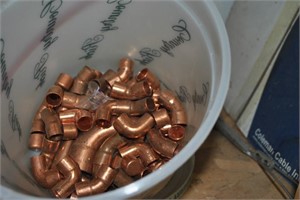 bucket of copper fittings