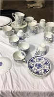 Blue and white dishes indies and flower cups and