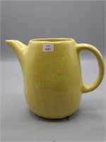 Yellow stoneware pottery pitcher marked "BB"