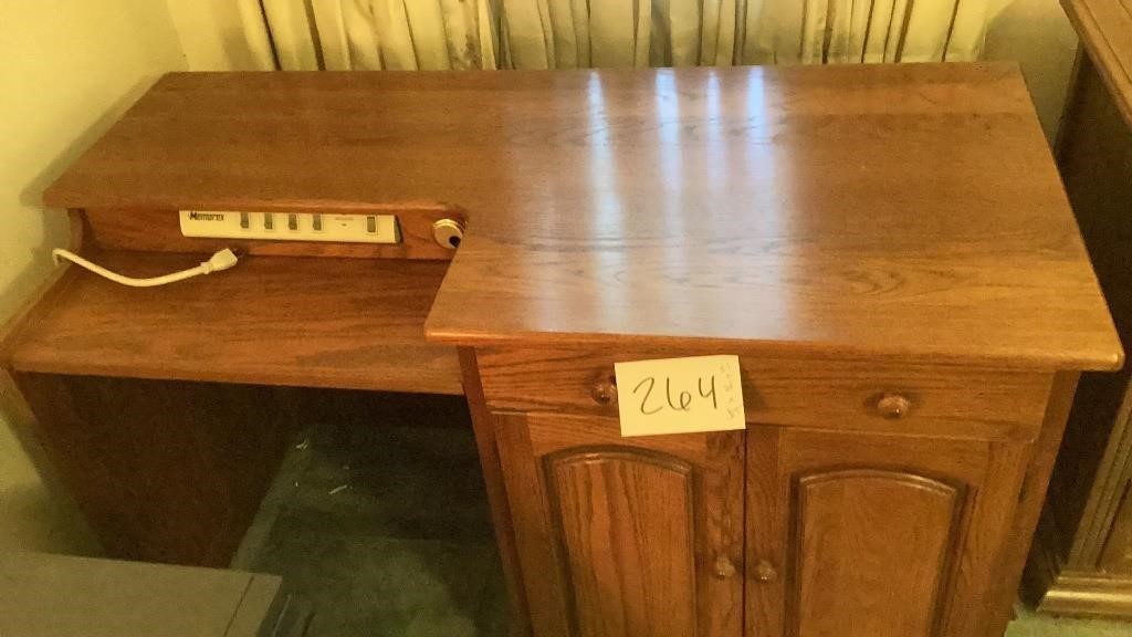 Oak computer desk, 51 x 24 x 30” tall, has a