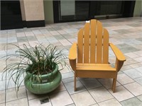 Adirondack Chair and Green Flower Pot