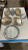 Various vintage silver plated platters.