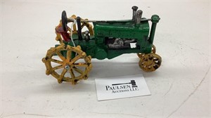 Rough cast toy tractor