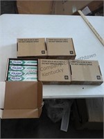 5 boxes of poligrip 4 tubes in each box