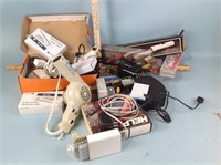 Blow dryer, clock radio, curling irons, unused