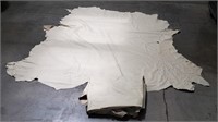 Pair of white leather hides