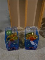Two hamster cages and accessories