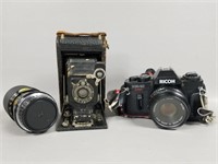 Two Vintage Cameras And Lens