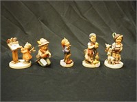 Five Hummel figurines ranging from 3 1/2"
