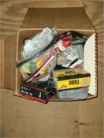 box of bike tubes and supplies