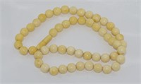 Vintage graduated ivory bead necklace