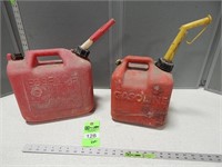 2 Plastic gas cans; 2 1/2 gallon and  2 gallon 2 o