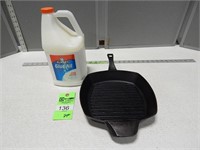 Cast iron skillet and gallon of glue