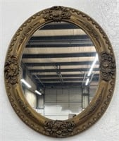 (Y) Oval Wall-Hung Mirror With Ornate Frame.