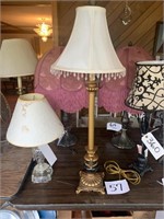 Candlestick lamp with black and gold base