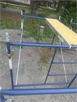 Metaltexh blue scaffolding with wallboard