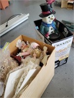 Snowman, box of doilies, doll, misc