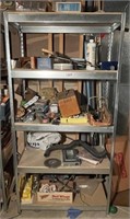 Metal storage shelf with contents