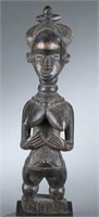Standing Baule style female figure. 20th century.