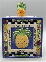 'Love Is' Ceramic Lidded Jar is 6x6in