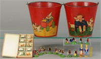 TWO SAND PAILS AND A GROUPING OF FIGURES