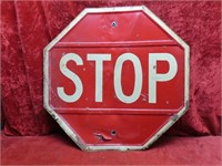 Old embossed STOP street sign. 24"