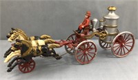 Vintage cast iron horse drawn fire carriage
