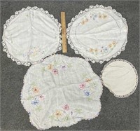4 crocheted & embroidered doilies,