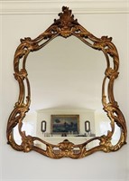 Large French carved gold framed wall mirror
