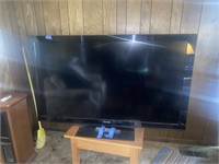 Sony Bravia Large Screen TV with Wooden Table