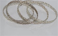 Four woven silver bangles