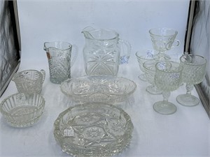 Assortment of clear glass, two pitchers, one