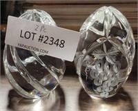 2 EGG-SHAPED CLEAR GLASS PAPERWEIGHTS