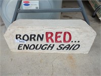 Stone sign w/ "Born RED... enough said!" Carved