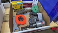 box w/ air chisel, tape measure, Staples,
