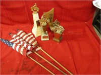 American flags & assorted motorcycle trophies.