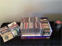 Various cds and cassettes and guitar strings