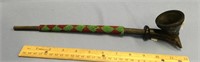 An American Indian pipe carved out of pipestone, 1