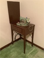 singer sewing machine and cabinet 185J