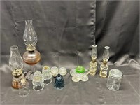 Four oil lamps, glass shades, glass coasters