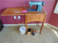 International sewing machine in cabinet with