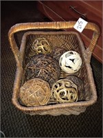 Basket of vine and metal carpet balls